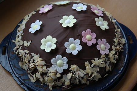 round chocolate cake with flower icings thumbnail