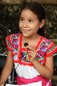 smiling girl holding microphone thumbnail