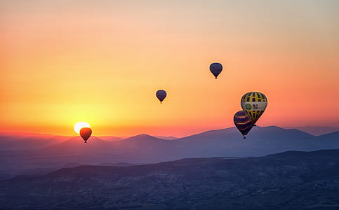 Assorted Hot Air Balloons Photo during Sunset thumbnail