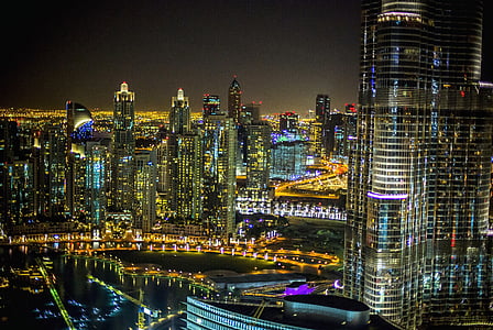 aerial photography of city buildings at night thumbnail
