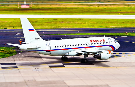 white and red Rossiya airliner thumbnail