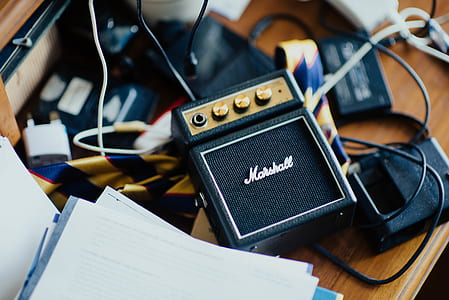 black Marshall MP3 player on desk thumbnail