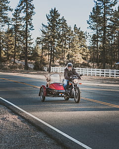 man riding motorcycle with sidecar thumbnail