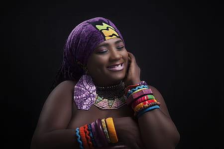 woman wearing purple headwrap thumbnail