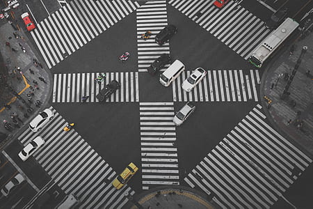 aerial photo of crossing cars during daytime thumbnail