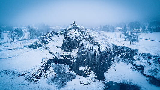 mountain covered with snow at daytime thumbnail
