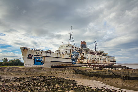 white ship on dock thumbnail