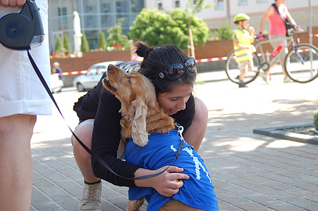 woman hugging English cocker spaniel thumbnail