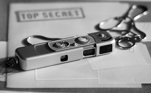 spy camera on top of Top Secret folder thumbnail