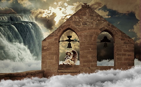angel statue on beige surface photo thumbnail
