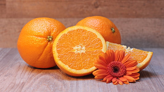 four sliced orange fruits thumbnail