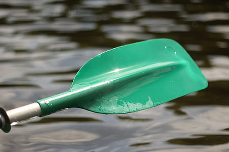 close up photo of green boat paddle thumbnail