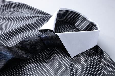 white and black collared shirt thumbnail