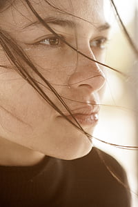 selective focus photography of woman's face thumbnail