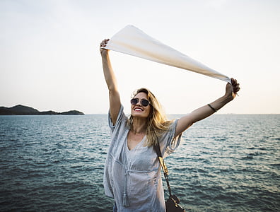 woman in white v-neck dress thumbnail