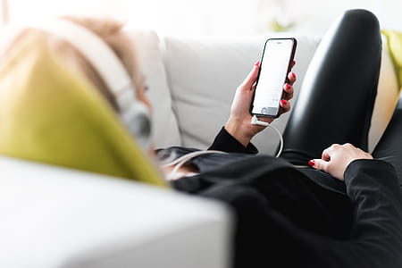 Woman Relaxing and Listening to Streamed Music thumbnail