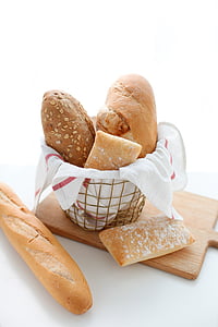 baked bread on brown wooden chopping board thumbnail