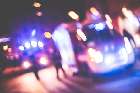 Blurred Emergency Cars At Night thumbnail