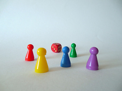 red dice and five piece of plastic toys thumbnail