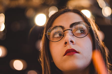 shallow focus photo of woman wearing eyeglasses thumbnail