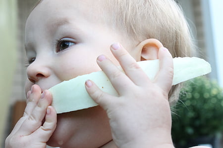 baby biting the fruit thumbnail