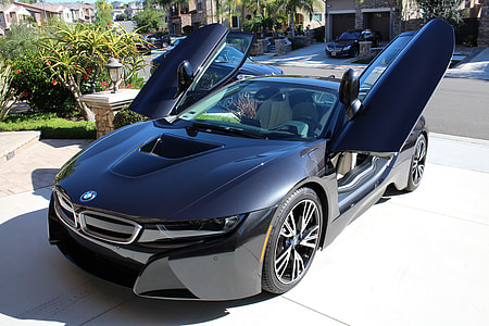 black BMW i8 coupe with opened scissor doors thumbnail