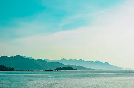 Landscape Photo of Mountain over Body of Water thumbnail