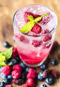 clear drinking glass with raspberries thumbnail