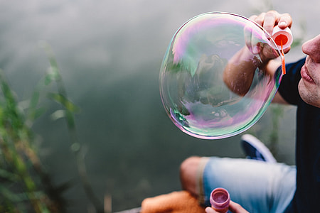 Having fun with soap bubbles in the nature thumbnail