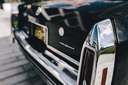 Close up of antique black and chrome Cadillac car thumbnail