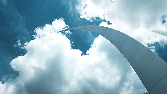 gray structure under cloudy sky during daytime thumbnail