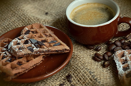 brown biscuit on top of brown saucer thumbnail