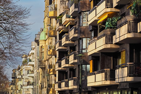 gray high rise building lot thumbnail
