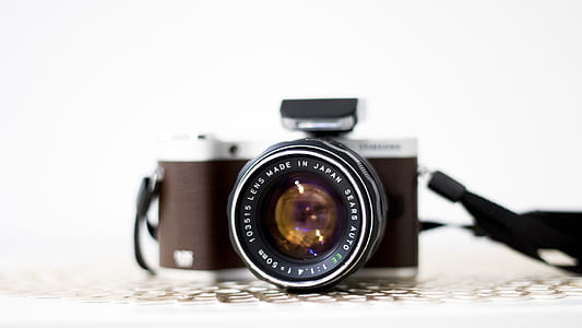 Black and Brown Dslr Camera thumbnail