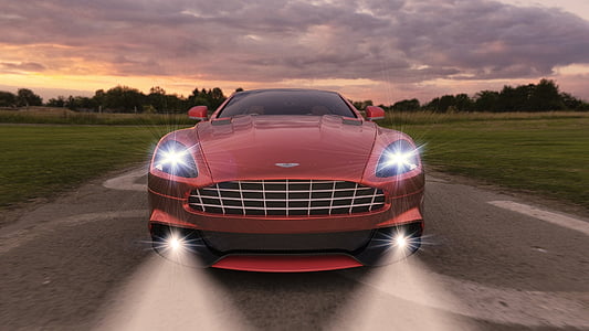 red car beside green grass field thumbnail