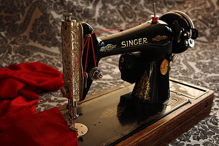 black and gray Single sewing machine with red textile thumbnail