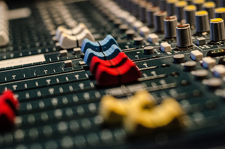 selective focus photography of audio mixer controller thumbnail