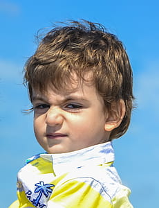 boy's yellow and white collared top photography thumbnail