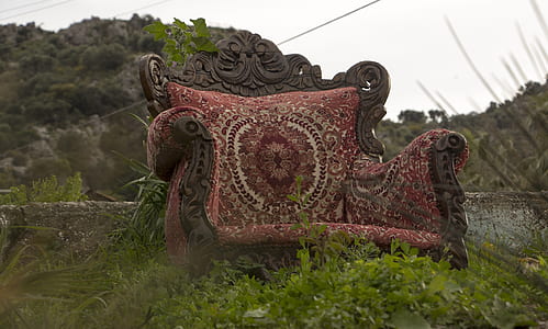 armchair on green grass thumbnail