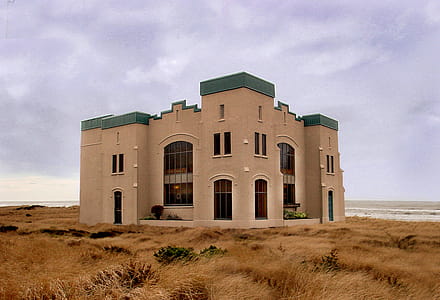 Brown Concrete Mansion at the Middle of Nowhere thumbnail