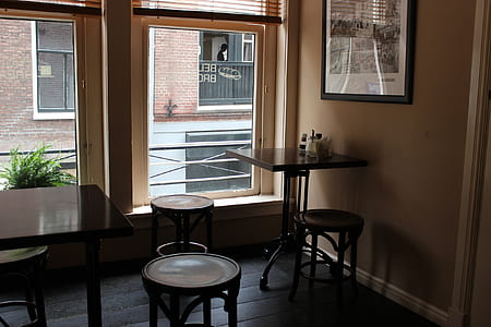 table and chairs beside window thumbnail