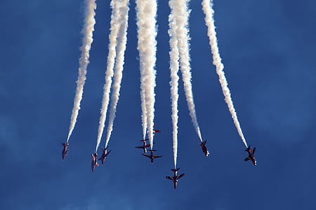airplane doing airshow at daytime thumbnail