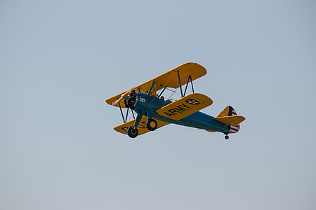 yellow and blue biplane on air thumbnail