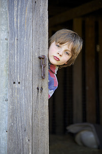 boy peeking on wall thumbnail
