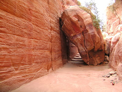 brown rock blocking a stairway thumbnail