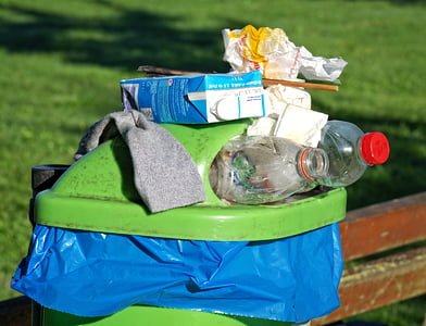 plastic bottles and blue tetra pack on dustbin thumbnail