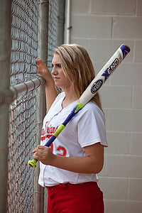 woman in white St. Louis Cardinals jersey shirt holding baseball bat thumbnail