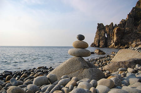 cairn stone on seashore thumbnail