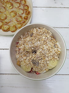 cereal with sliced bananas on table thumbnail