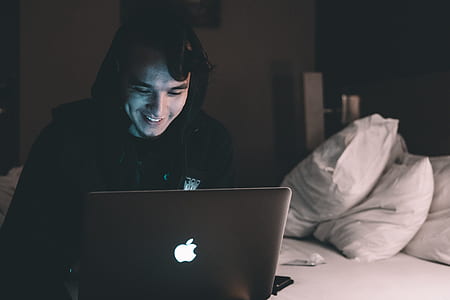 man sitting on bed thumbnail